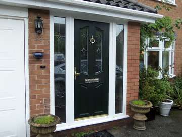 Mr & Mrs W. : KELSALL CHESHIRE ; Installation of an Apeer 70 Triple glazed door and side panel. Std Green with design bevels. U Value .85 Pvcu bi folding doors Manchester